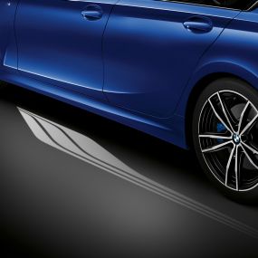 BMW 3 Series Sedan, Welcome Light Carpet Detailed side view of the open driver's door with Welcome Light Carpet.