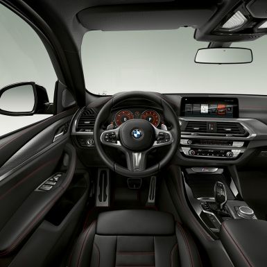 BMW X4 M40i and BMW X4 M40d, cockpit. BMW X4 M40i and BMW X4 M40d, interior, cockpit with sport seats and M leather steering wheel.