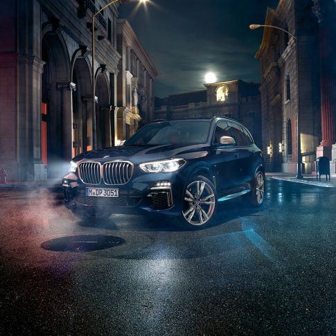 Headlights BMW X5 M50i and M50d Headlights with X Laserlight BMW X5 M50i and M50d G05 Carbon black metallic three-quarter front view