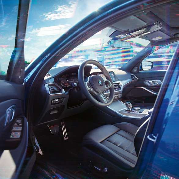 BMW 3 Series Sedan, interior Close-up of the driver's compartment in the interior of the BMW 3 Series Sedan.