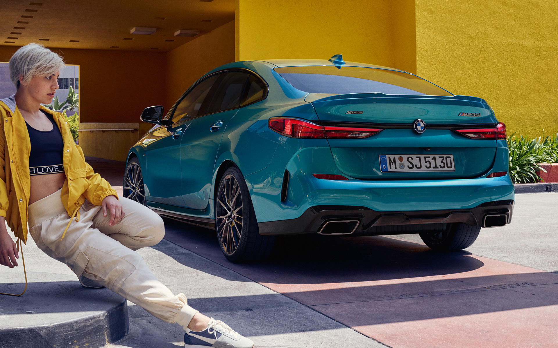 Powerful rear BMW 2 Series Gran Coupé F44 Snapper Rocks Blue metallic three-quarter side view