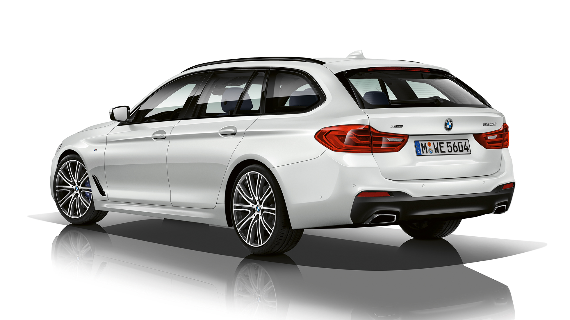 M Sport package three-quarter rear view BMW 5 Series Touring M Sport package BMW 5 Series Touring 530d xDrive Touring G31 Alpine White three-quarter rear view
