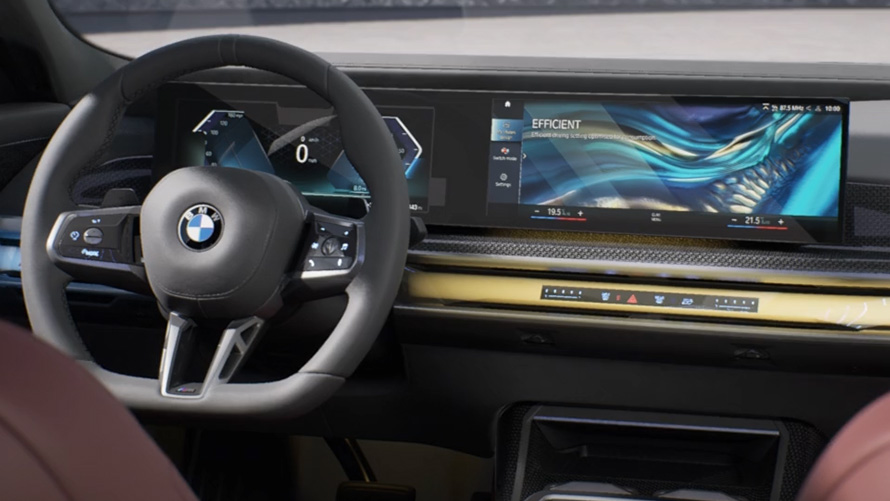 BMW 7 Series Sedan G70 ICE 740i M sports package three quarter rear view BMW 7 Series Sedan G70 ICE 740i M sports package three quarter rear view driving