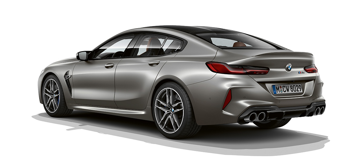 BMW M8 Gran Coupé three-quarter rear view BMW M8 Gran Coupé F93 2020 BMW Individual Frozen Dark Silver three-quarter rear view