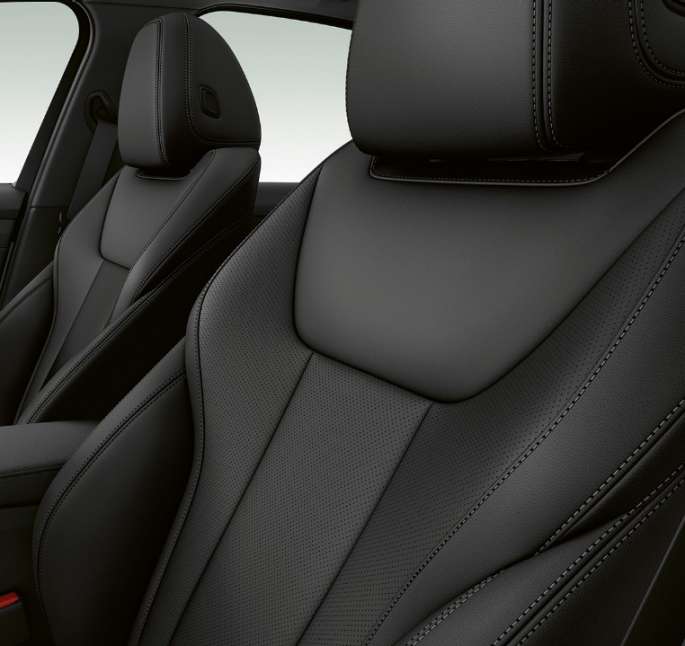 Side close-up of the front seats of the BMW 3 Series Sedan with Model Sport Line features.